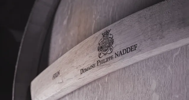 Dřevěný sud s označením Domaine Philippe Naddef.